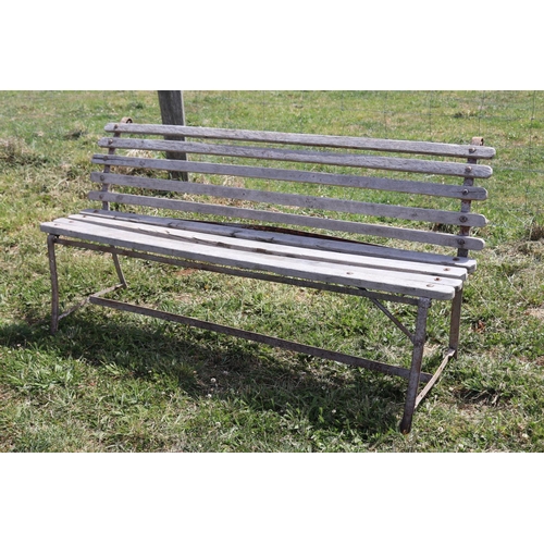 101 - Antique wrought iron flat bar and wooden garden bench, approx 197cm L