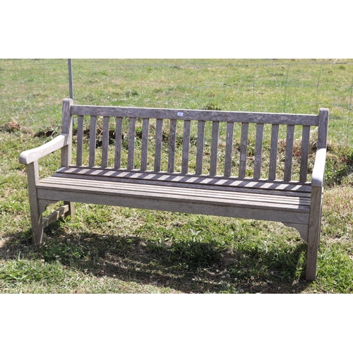 103 - Cottswold Aged teak garden bench, approx 180cm L