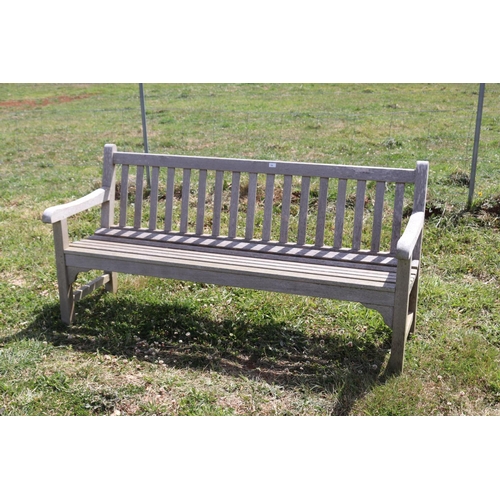 104 - Cottswold Aged teak garden bench, approx 180cm L