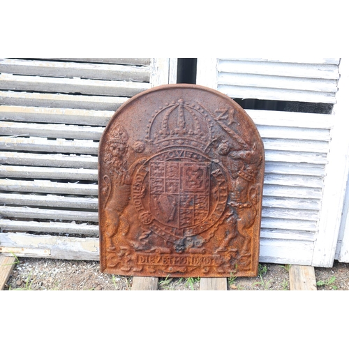 194 - Antique French early arched fire back, in relief with crown and armorial shield, approx 69cm H