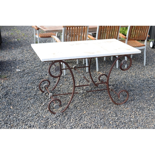 196 - Antique French scrolling iron & marble topped butchers table, approx 130cm L x 75cm D x 76cm H