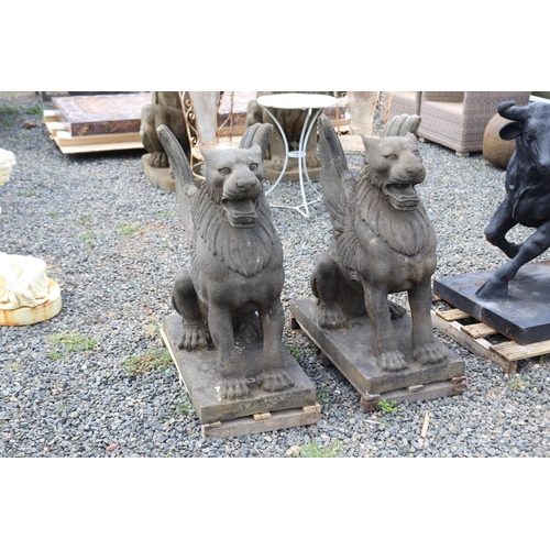 232 - Pair of large composite faux sandstone winged Chimera, approx 85cm H each (2)