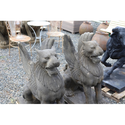 232 - Pair of large composite faux sandstone winged Chimera, approx 85cm H each (2)