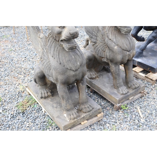 232 - Pair of large composite faux sandstone winged Chimera, approx 85cm H each (2)