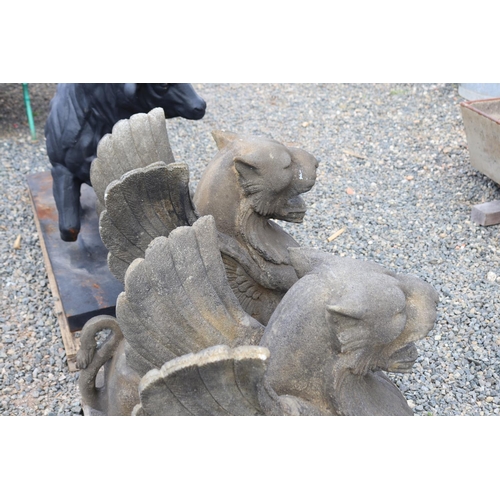 232 - Pair of large composite faux sandstone winged Chimera, approx 85cm H each (2)