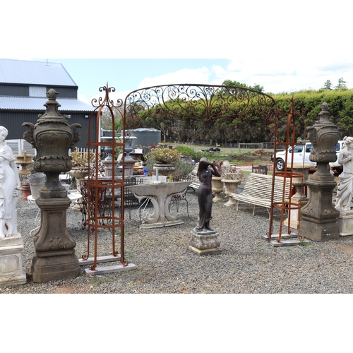 233 - Two large cast composite faux sandstone urns on pedestal, approx 228cm H each (2)