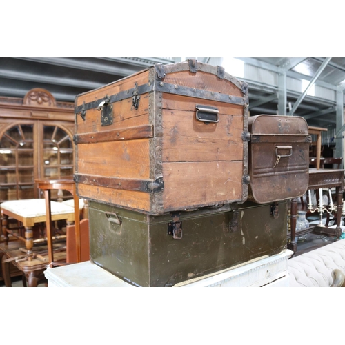 592 - Three trunks, one antique dome topped, two old tin examples, approx 54cm H and shorter (3)