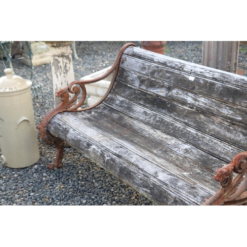 70 - Cast iron griffin end support garden bench, wooden slats, approx 142cm W