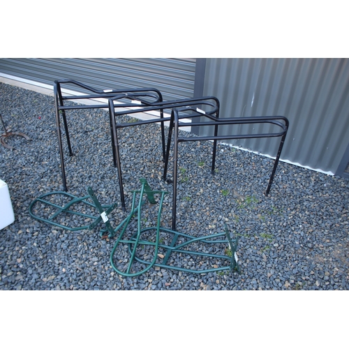 246 - Various metal wall mountable saddle racks (6)