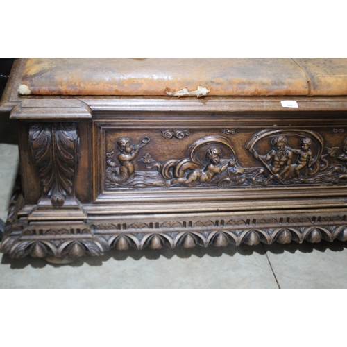 448 - Antique 19th century French carved walnut coffer, with later leather upholstered top bench seat, app... 