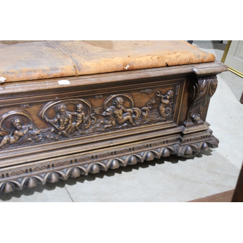 448 - Antique 19th century French carved walnut coffer, with later leather upholstered top bench seat, app... 