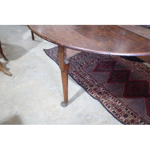 493 - Georgian II oak drop side table, with pad feet, approx 69cm H x 152cm W x 167cm D (with sides up)