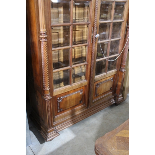 500 - Antique French walnut two door bookcase, with beveled glass paneled doors, approx 258cm H x 140cm W ... 