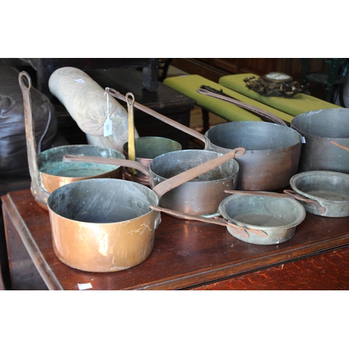 559 - Selection of antique French copper and iron handled sauce pans, approx 25.5cm Dia x 51cm L and small... 