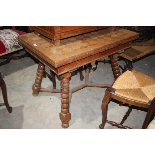 591 - French oak drawer leaf dining table, with unusual bobbin turned splay legs joined by a X frame stret... 