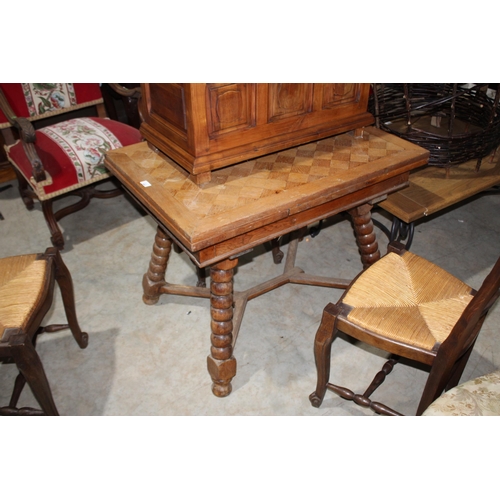 591 - French oak drawer leaf dining table, with unusual bobbin turned splay legs joined by a X frame stret... 