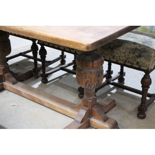 601 - An 18th century style oak refectory table, on bulbous turned supports, approx 152cm long x 98cm wide... 