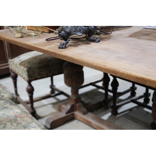 601 - An 18th century style oak refectory table, on bulbous turned supports, approx 152cm long x 98cm wide... 