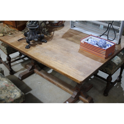 601 - An 18th century style oak refectory table, on bulbous turned supports, approx 152cm long x 98cm wide... 