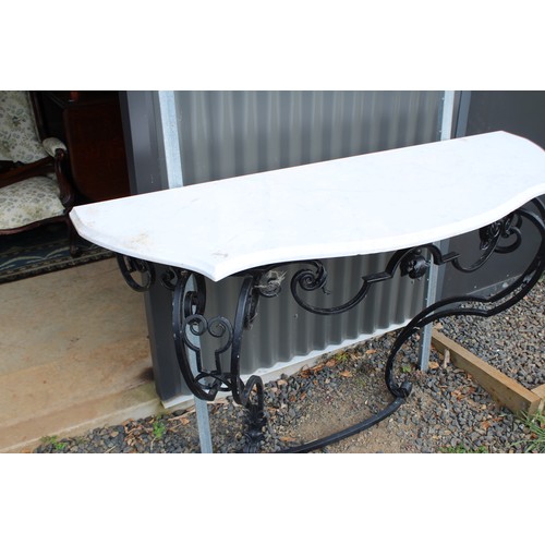 148 - French wrought iron support, marble topped console table, approx 140cm W x 50cm D x 93cm H