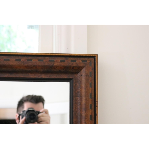 1003 - Antique style figured yew wood and inlaid framed mirror, ebonized inner slip, approx 105cm H x 85cm ... 