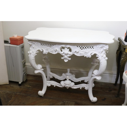 1011 - Elaborate white painted mahogany center table, approx 84cm H x 108cm W x 74cm D