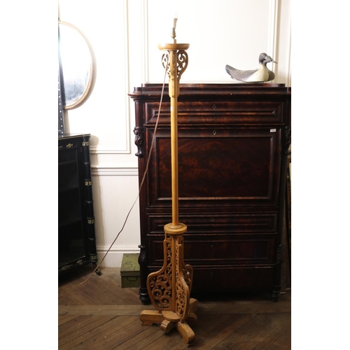 1021 - Oriental carved wood standard lamp, tri form pierced base, approx 131cm H