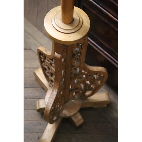 1021 - Oriental carved wood standard lamp, tri form pierced base, approx 131cm H