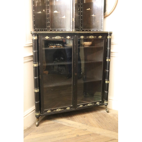 1024 - Antique French empire revival glazed two door corner cabinet, with applied cast brass mounts, showin... 