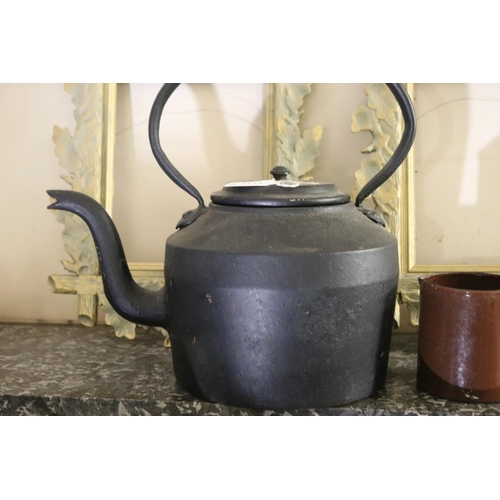 1113 - Antique cast iron kettle, along with an antique brown enamel jug, approx 35cm H x 37cm W and smaller... 