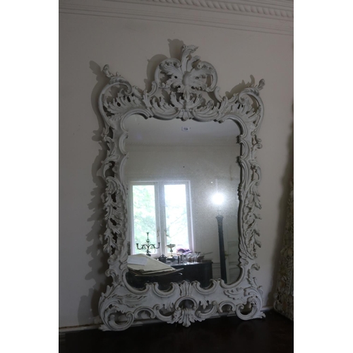 1128 - Antique style wall mirror, with C scrolls and foliage frame, approx 143cm H x 92cm W