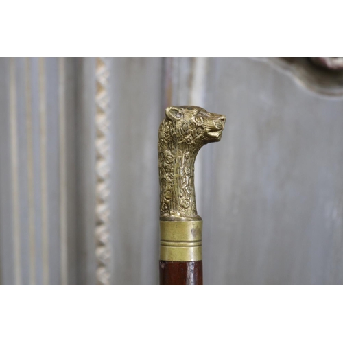 1156 - Walking stick cast brass leopards head mount, approx 97cm L