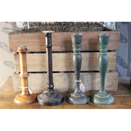 1189 - Four candlesticks, approx 33cm H and shorter (4)
