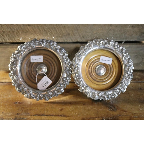 1212 - Two silver plate wine bottle coasters, each approx 4cm H x 18cm Dia (2)