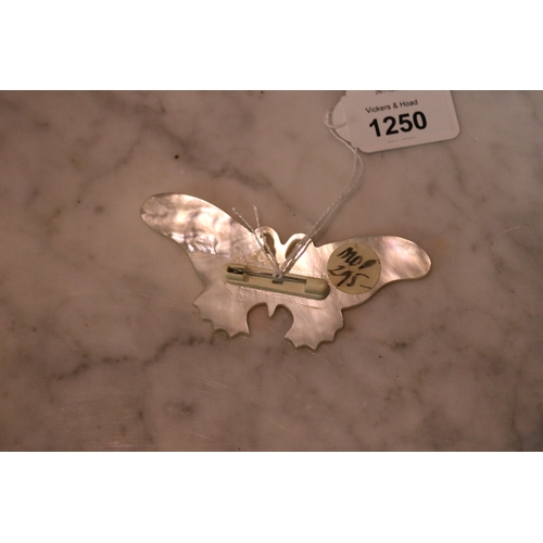 1250 - Mother of pearl butterfly brooch 11cm W