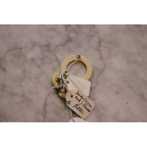 1285 - Pair of ivory clip earrings, circular brooch