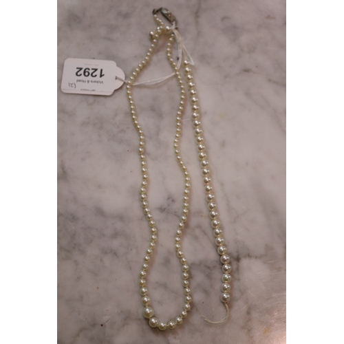 1292 - Graduated fresh water seed pearl necklace with silver clasp along with a small strand of Mikimoto cu... 