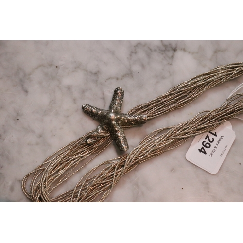 1294 - Silver multistrand chocker with a star fish pendant