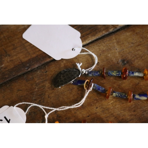 1319 - Lapis and amber necklace with beaten silver clasp, approx 73cm L