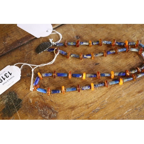 1319 - Lapis and amber necklace with beaten silver clasp, approx 73cm L