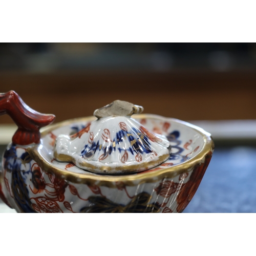 1368 - Rare antique shell form ink pot, decorated in imari colours, (small chip to the cover), approx 7cm H... 