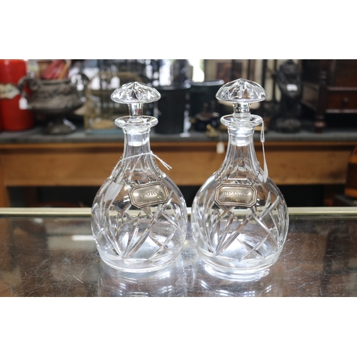 1379 - Good pair of cut crystal decanters, each with sterling labels (brandy and Port)  approx 24cm H each ... 