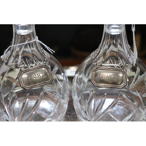 1379 - Good pair of cut crystal decanters, each with sterling labels (brandy and Port)  approx 24cm H each ... 