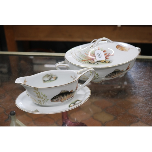 1388 - China fish decorated tureen and sauce boat. approx 33cm W and smaller (2)