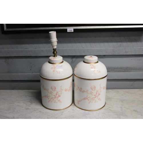 1715 - Pair of pink hand painted toleware lamps ,one wired, approx 44cm H and shorter