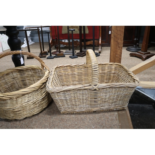 1722 - Two cane baskets, approx 34cm H including handle x 55cm W x 39cm D and smaller