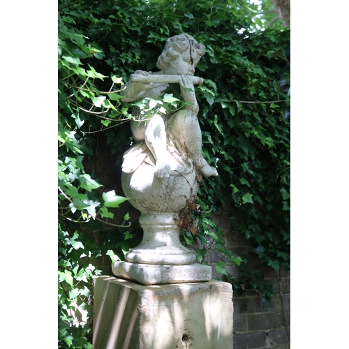 2004 - Garden composite stone putti playing a flute on a large square stone pedestal, approx 186cm H