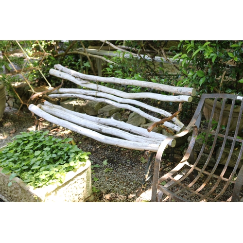 2020 - Antique cast iron branch form bench ends with bleached gum tree branch set and back, approx 163cm W