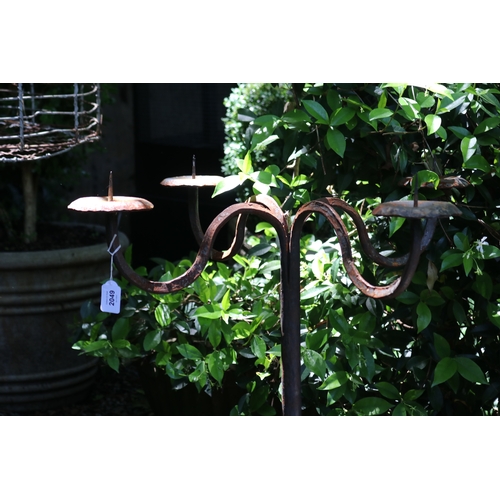 2049 - Wrought iron four stick candelabrum, approx 134cm H