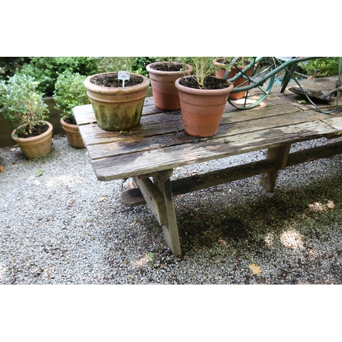 2054 - Rustic long plank trestle table, approx 305cm L x 88cm D x 72cm H